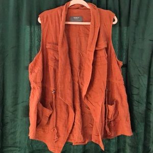 Rust/terracotta vest